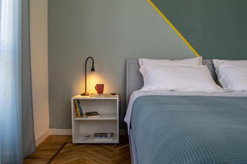 Postel nebo postele na pokoji v ubytování Ca Emma - Homy Home