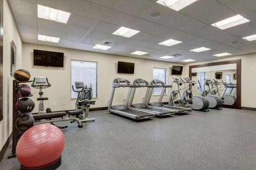 a gym with several treadmills and machines in it at Hampton Inn-St. Louis Wentzville, MO in Wentzville