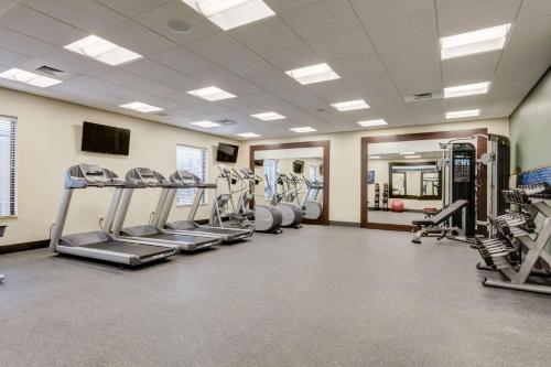 a gym with treadmills and machines in a room at Hampton Inn-St. Louis Wentzville, MO in Wentzville