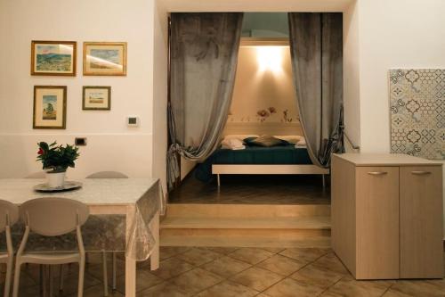 Ένα ή περισσότερα κρεβάτια σε δωμάτιο στο Casa Vico Primo