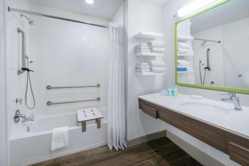 a bathroom with a sink and a shower at Hampton Inn & Suites By Hilton-Corpus Christi Portland,Tx in Portland