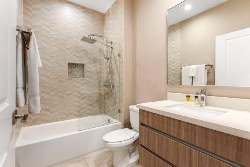 7458 Modern 9 guests 3 suites jacuzzi 8 min Disney photo 23