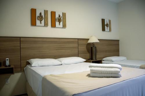 Katil atau katil-katil dalam bilik di Hotel Dona Paschoalina