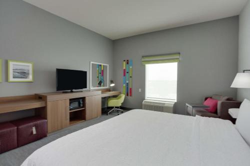 TV a/nebo společenská místnost v ubytování Hampton Inn Fort Lauderdale Pompano Beach