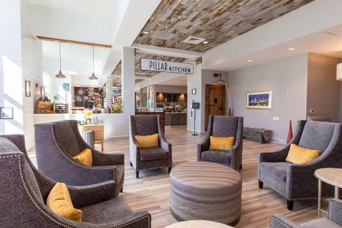 a salon with chairs and a waiting room at Hilton Garden Inn Asheville Downtown in Asheville