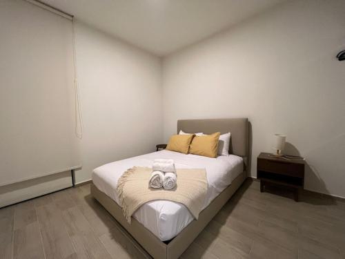 Postel nebo postele na pokoji v ubytování Departamento Ajijic Jalisco.