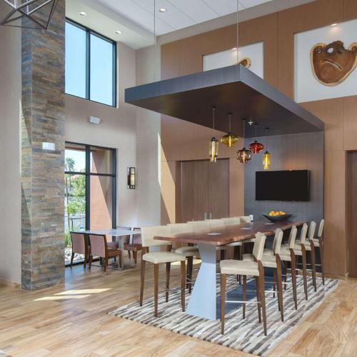 a dining room with a large table and chairs at Hampton Inn & Suites Murrieta Temecula in Murrieta
