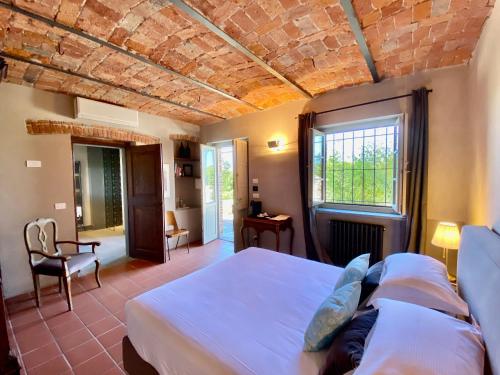 Postel nebo postele na pokoji v ubytování MiaClara Relais
