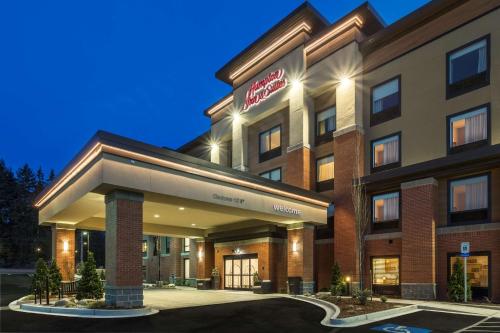 a rendering of a hotel building at night at Hampton Inn & Suites- Seattle Woodinville Wa in Woodinville