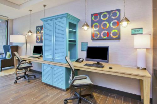 an office with a blue cabinet and a desk with a computer at Home2 Suites By Hilton Pittsburgh Area Beaver Valley in Monaca