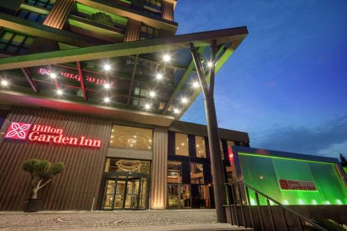 a building with a sign in front of it at Hilton Garden Inn Yalova in Yalova