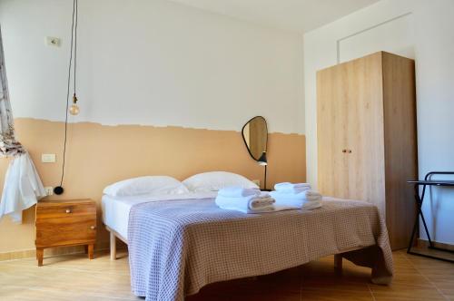 Postel nebo postele na pokoji v ubytování Blue Oasis Apartment