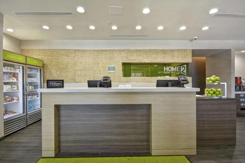 a lobby of a store with a home counter at Home2 Suites By Hilton Texas City Houston in Texas City