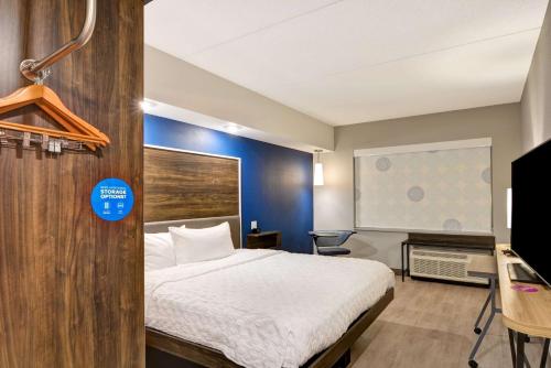 Ένα ή περισσότερα κρεβάτια σε δωμάτιο στο Tru by Hilton Syracuse North Airport Area