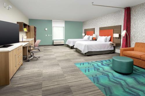 Ένα ή περισσότερα κρεβάτια σε δωμάτιο στο Home2 Suites by Hilton Lakeland South Polk Parkway