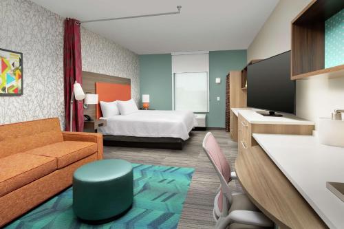 Ένα ή περισσότερα κρεβάτια σε δωμάτιο στο Home2 Suites by Hilton Lakeland South Polk Parkway