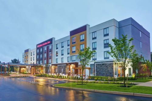 a rendering of the exterior of a building at Hilton Garden Inn Princeton Lawrenceville in Lawrenceville