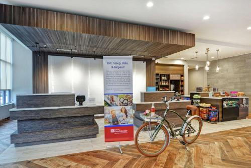 a store with a bike parked in a room at Hilton Garden Inn Princeton Lawrenceville in Lawrenceville