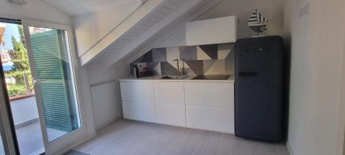 Kuchyň nebo kuchyňský kout v ubytování DIANO Design&Suite Jeans