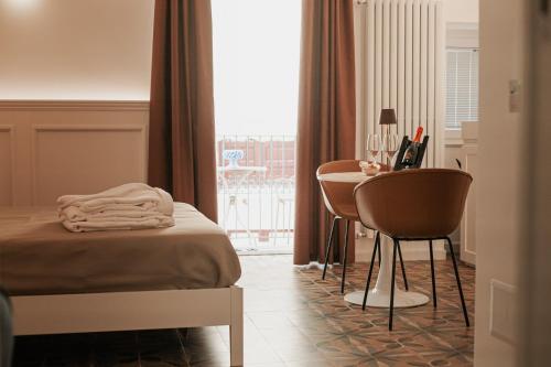 Ένα ή περισσότερα κρεβάτια σε δωμάτιο στο I Mori Apartments