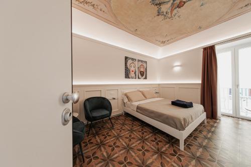Ένα ή περισσότερα κρεβάτια σε δωμάτιο στο I Mori Apartments