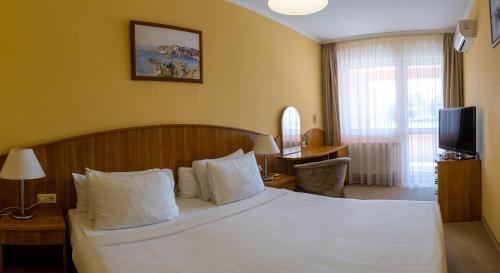 Телевизор и/или развлекательный центр в Belenus Thermalhotel superior