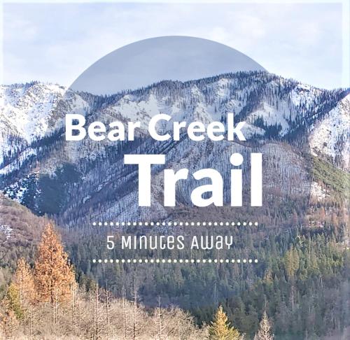 a sign that reads bear creek trail in the mountains at Redwood Retreat, Mountains, Adventure and Nature in Ponderosa