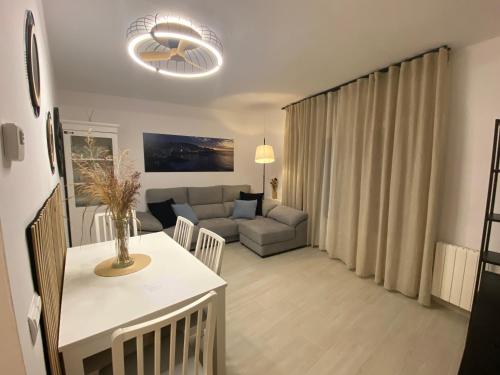 Posezení v ubytování APARTAMENTS L’ARC