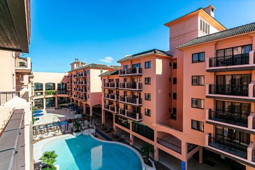 Bazén v ubytování Estúdios Modernos em Resort pé na areia - Jurerê Beach Village JBVJR nebo v jeho okolí