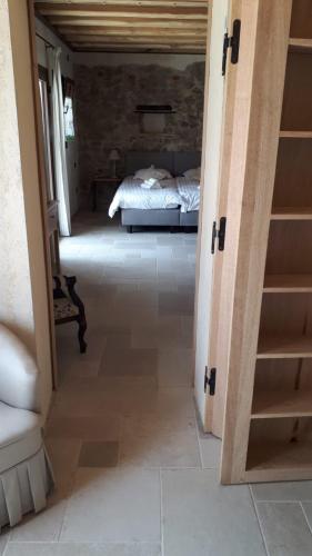 a view of a bedroom with a bed through a doorway at Agriturismo La Pina in Tarzo