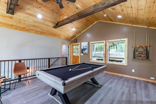 a pool table in a room with a ceiling at Cozy cabin in Ellijay, near Blue Ridge ! in Ellijay