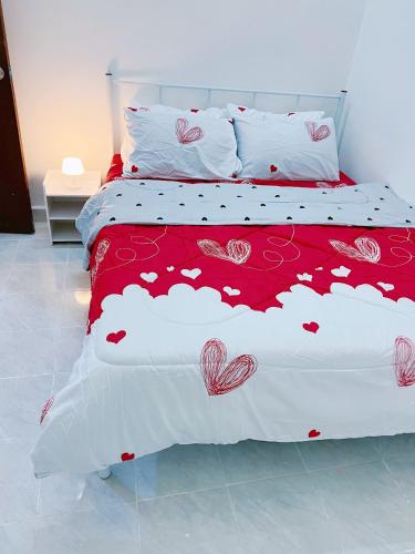 Ένα ή περισσότερα κρεβάτια σε δωμάτιο στο Iman Homestay Temerloh