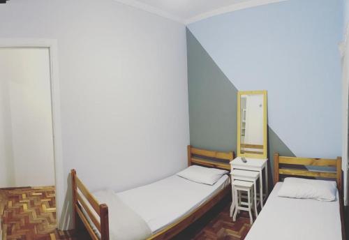 Cama ou camas em um quarto em FLÓRIDA POUSADA