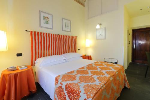 Katil atau katil-katil dalam bilik di Relais Lavagnini Florence