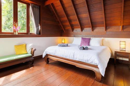 Katil atau katil-katil dalam bilik di Baan Suay Villa