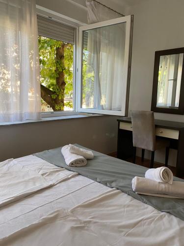Postel nebo postele na pokoji v ubytování Apartman Nika