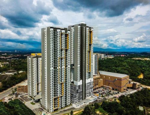 an overhead view of a building with tall buildings at MesaHill Homestay, Nilai by S&T Homez in Nilai