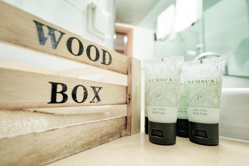 a couple of bottles of wood box products on a counter at Shoham Sea and Soul in Eilat