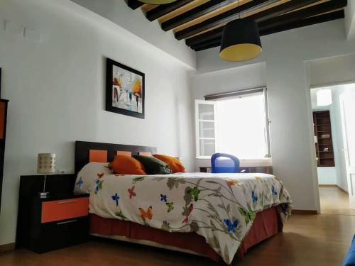 Кровать или кровати в номере Vacaciones en Cádiz