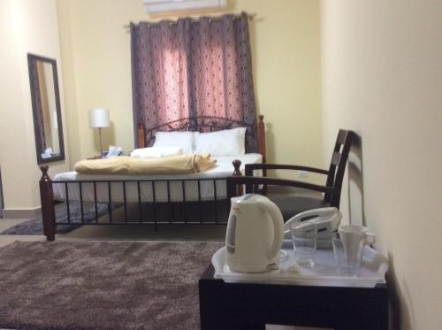 Cama o camas de una habitación en Sakan 275