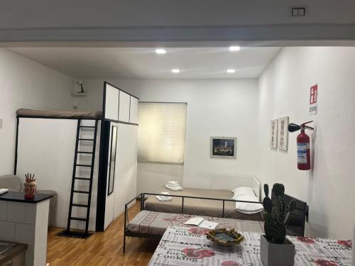 A bed or beds in a room at La casetta mape