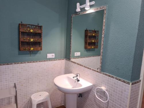 a bathroom with a sink and a mirror at REf 112 ATICO EN ZAHARA MAR in Zahara de los Atunes