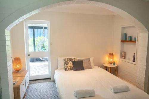 Postel nebo postele na pokoji v ubytování Araluen