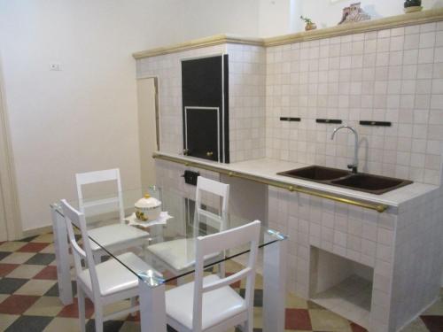 Кухня или мини-кухня в B&B Il Ventaglio
