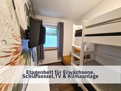 TV o dispositivi per l'intrattenimento presso Ferienhaus Rothsee-Oase ideale Ausgangslage mit tollem Ausblick, Sauna und privatem Garten