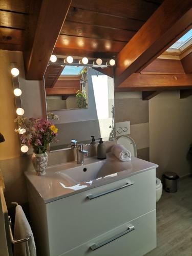 a bathroom with a sink and a mirror at Apartment Harmony in Bale
