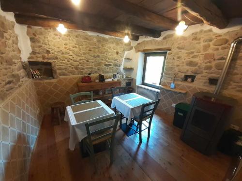 an overhead view of a room with a table and chairs at La Casa Torre in Pignone