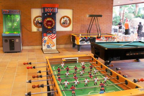 a room with a pool table and ping pong balls at Apartamentos La Era Park in Benidorm