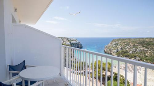 a balcony with a view of the ocean at Seth Playa Azul in Cala en Porter