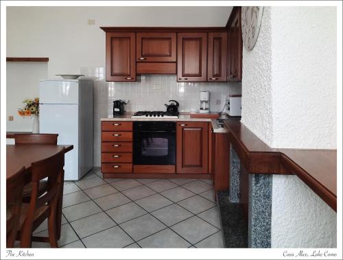 Kuchyň nebo kuchyňský kout v ubytování Casa Alice con bellissimo giardino e BBQ